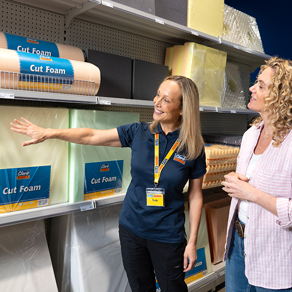 A customer feeling the foam options with a sample instore