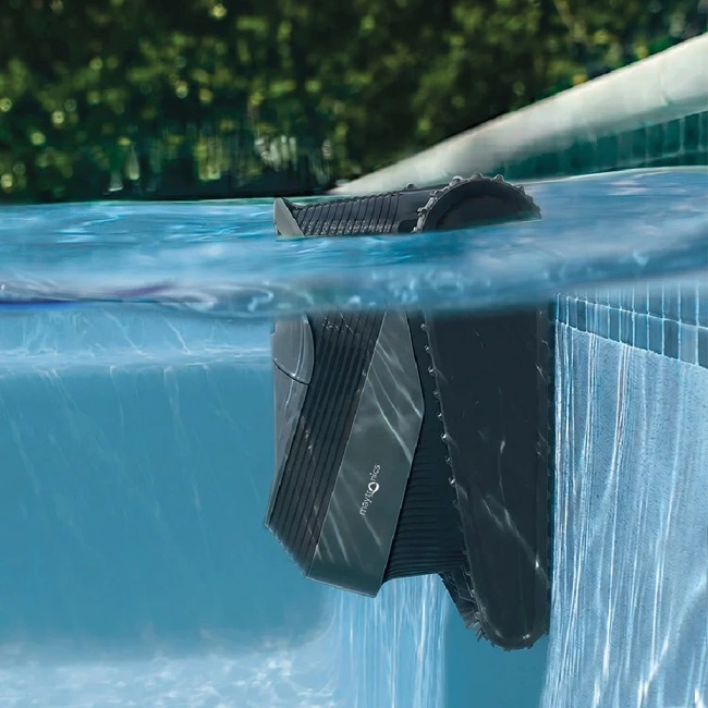 Dolphin robotic pool cleaner cleaning a residential swimming pool