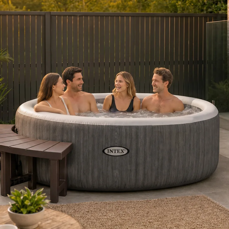 Inflatable spa set up in a stylish backyard with seating, plants and accessories. Inflatable spa creating a relaxing outdoor retreat with comfortable accessories.