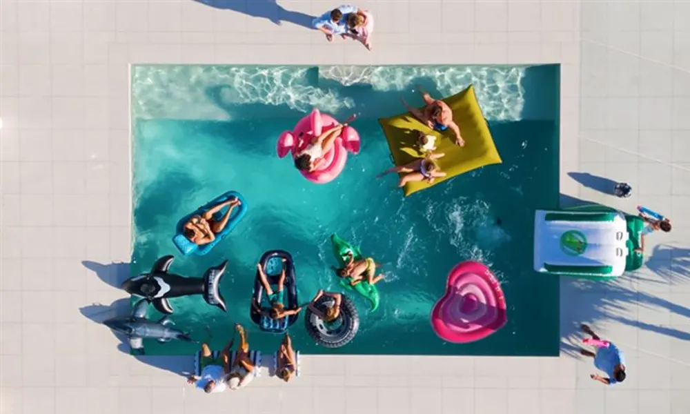 Group of people playing in the pool